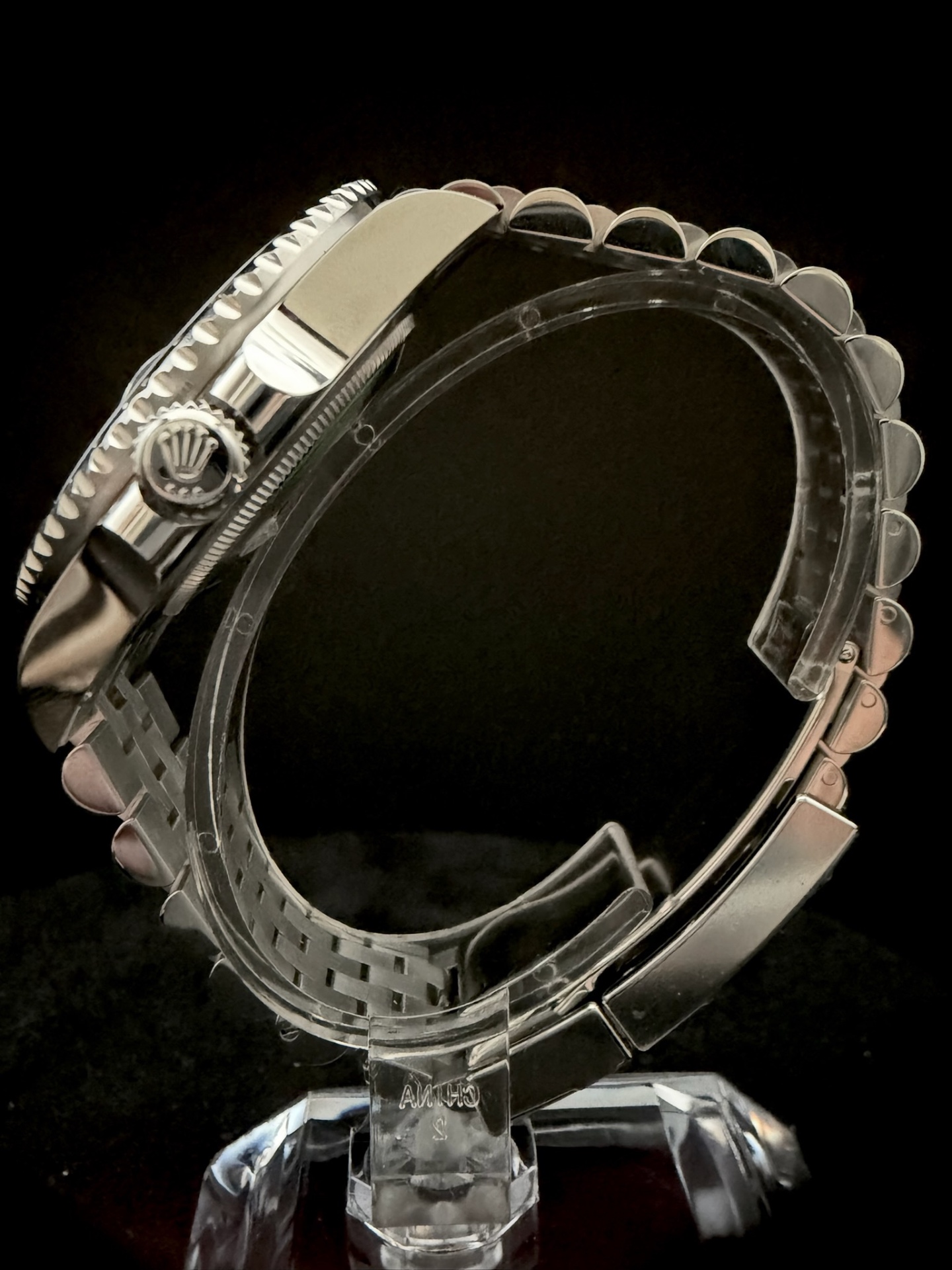 2026 Rolex GMT-Master II Batgirl 126710BLNR opposite side profile showing screw-down Triplock crown and bezel teeth