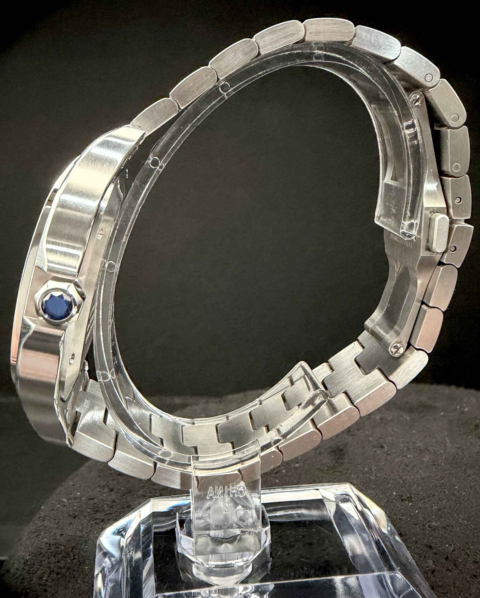 2025 Cartier Santos Large — crown side profile showing blue spinel cabochon