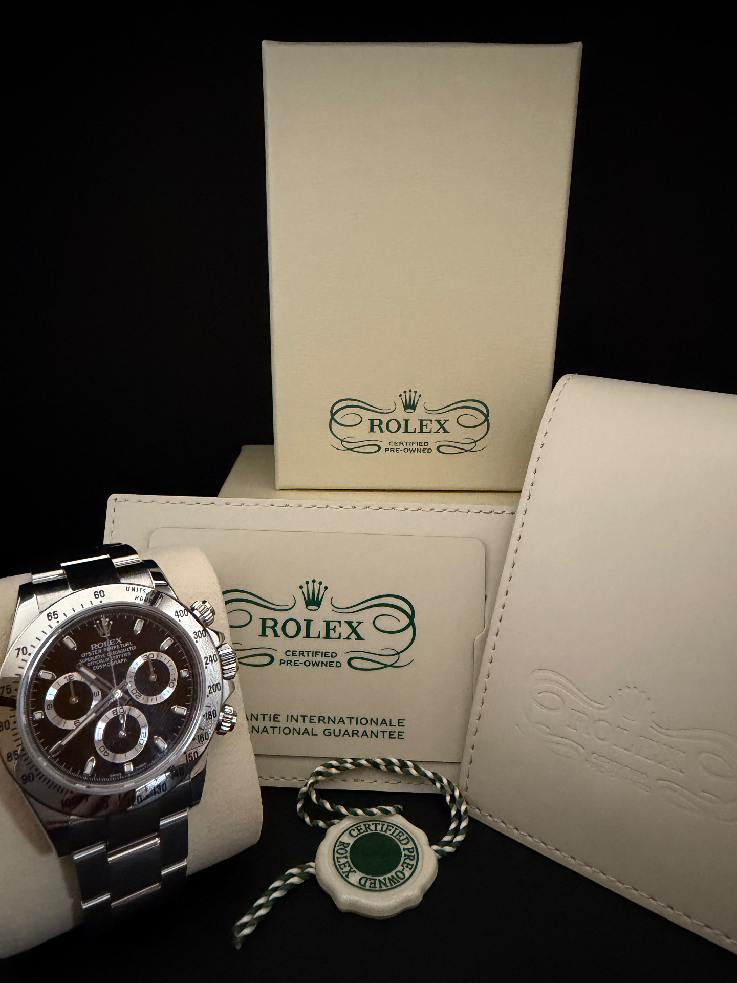 2015 Rolex Cosmograph Daytona 116520 stainless steel with CPO box, guarantee, and hang tag