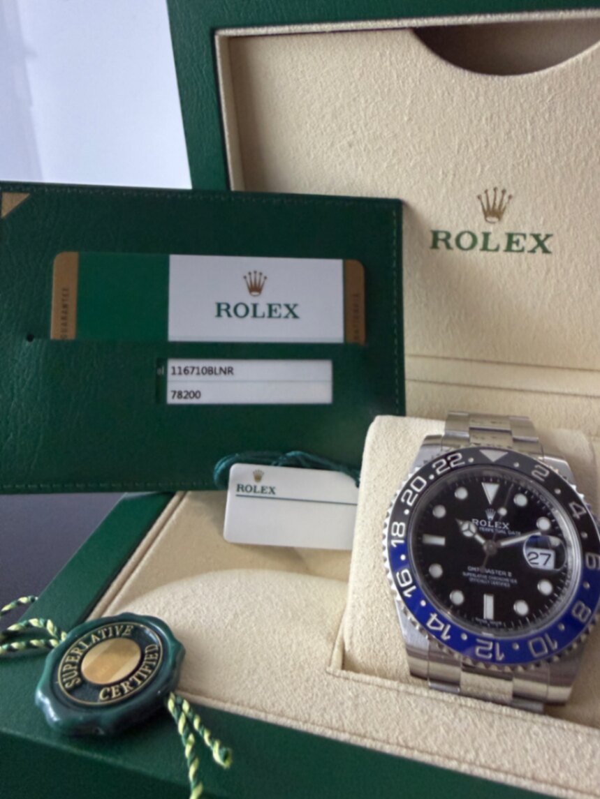 2018 Rolex GMT-Master II Batman 116710BLNR in original Rolex box with reference card showing 116710BLNR