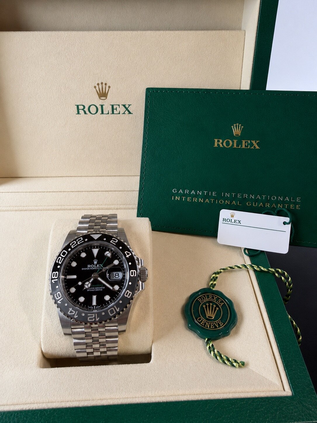 2026 Rolex GMT-Master II Bruce Wayne 126710GRNR in original green Rolex presentation box with International Guarantee card