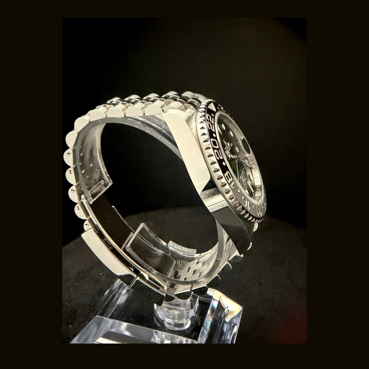 2026 Rolex GMT-Master II Bruce Wayne 126710GRNR opposite side profile showing case flank and Cerachrom bezel edge