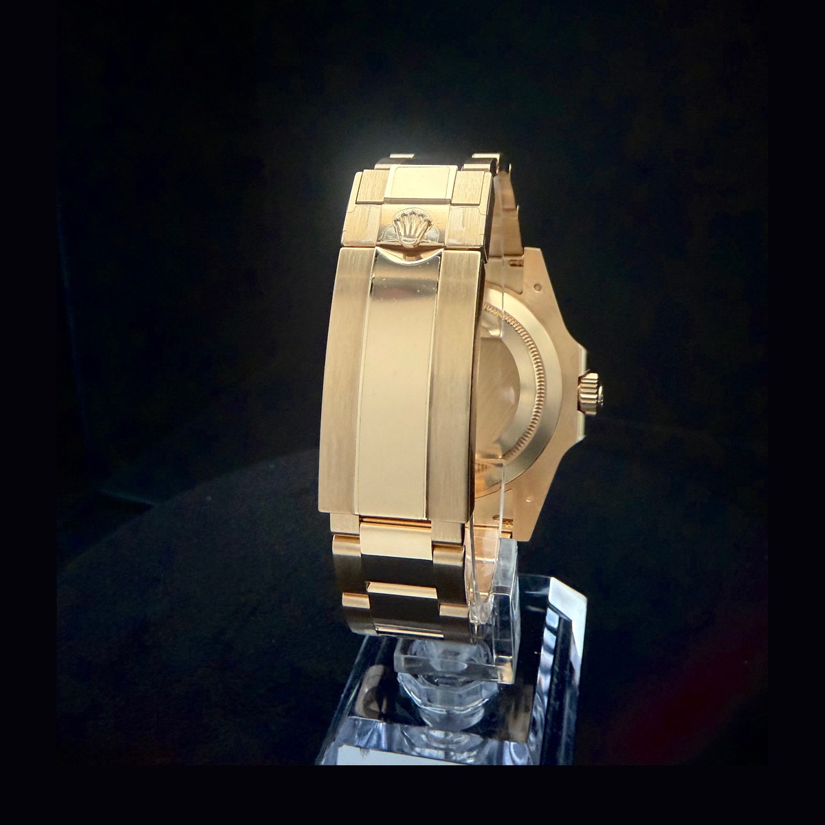 Rolex Submariner 126618LB caseback view with 18k yellow gold Oyster bracelet and Rolex coronet clasp